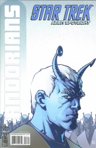 Star Trek Alien Spotlight Andorians Cover 1A   An Andorian alien with a pair of antennae protruding from his forehead is in the foreground, looking very serious. In the background, other Andorians look on.